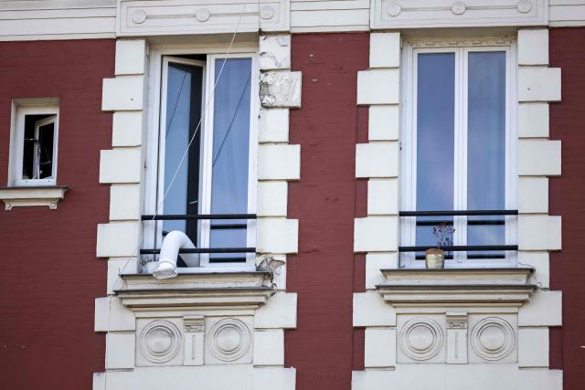 This photograph shows the hose of an air conditioner out of the window of an apartment during a heatwave in Charenton le Pont, southeast of Paris, on July 11, 2026. (Photo by Behrouz MEHRI / AFP)