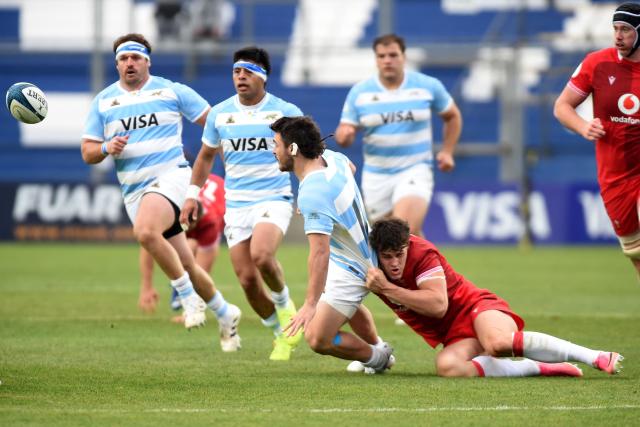 Argentina's wing Mateo Carreras is tackled by Wales' centre Eddie James during the Rugby Union Nations Championship match between Argentina and Wales at San Juan del Bicentenario stadium in San Juan, Argentina, on July 11, 2026. (Photo by Andres LARROVERE / AFP)