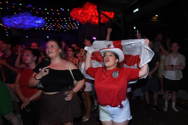 England fans react while watching the 2026 World Cup quarter-final football match between England and Norway, at Camp and Furnace in Liverpool, north-west England on July 11, 2026. (Photo by PETER POWELL / AFP)