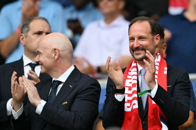 Norway's Crown Prince Haakon (R) and FIFA President Gianni Infantino (L) attend the 2026 World Cup football tournament quarter-final match between Norway and England at Miami Stadium in Miami Gardens on July 11, 2026.  (Photo by CHANDAN KHANNA / AFP)
