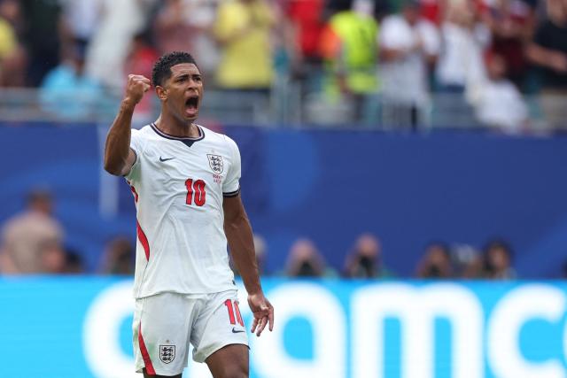 England's midfielder #10 Jude Bellingham celebrates after scoring the equalising goal during the 2026 World Cup football tournament quarter-final match between Norway and England at Miami Stadium in Miami Gardens on July 11, 2026.  (Photo by PATRICIA DE MELO MOREIRA / AFP)