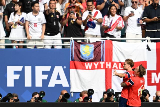 Norway's midfielder #21 Andreas Schjelderup (L) celebrates with Norway's midfielder #06 Patrick Berg after scoring his team's first goal during the 2026 World Cup football tournament quarter-final match between Norway and England at Miami Stadium in Miami on July 11, 2026.  (Photo by ROBERTO SCHMIDT / AFP)