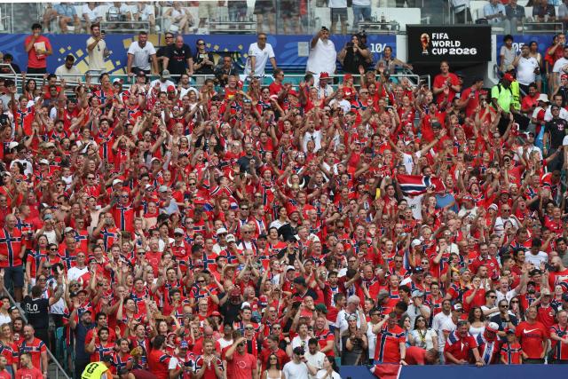 Norway fans cheer during the 2026 World Cup football tournament quarter-final match between Norway and England at Miami Stadium in Miami Gardens on July 11, 2026.  (Photo by PATRICIA DE MELO MOREIRA / AFP)