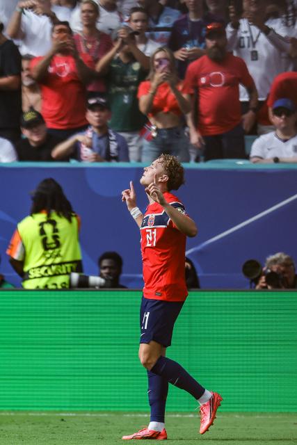 Norway's midfielder #21 Andreas Schjelderup reacts after scoring his team's first goal during the 2026 World Cup football tournament quarter-final match between Norway and England at Miami Stadium in Miami Gardens on July 11, 2026.  (Photo by PATRICIA DE MELO MOREIRA / AFP)