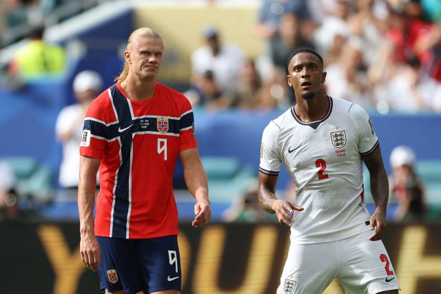 Norway's forward #09 Erling Braut Haaland reacts next to England's defender #02 Ezri Konsa during the 2026 World Cup football tournament quarter-final match between Norway and England at Miami Stadium in Miami Gardens on July 11, 2026.  (Photo by PATRICIA DE MELO MOREIRA / AFP)