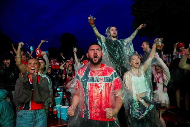 Fans react as they watch on a screen the 2026 World Cup football tournament quarter-final match between Norway and England in central Oslo on July 11, 2026. (Photo by Javad Parsa / NTB / AFP) / Norway OUT