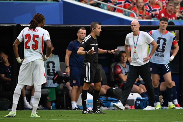French referee Clement Turpin disallows a penalty for England after a VAR review during the 2026 World Cup football tournament quarter-final match between Norway and England at Miami Stadium in Miami Gardens on July 11, 2026.  (Photo by MAURO PIMENTEL / AFP)