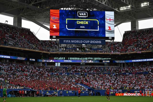 A giant screen shows a goal under VAR review during the 2026 World Cup football tournament quarter-final match between Norway and England at Miami Stadium in Miami Gardens on July 11, 2026.  (Photo by MAURO PIMENTEL / AFP)