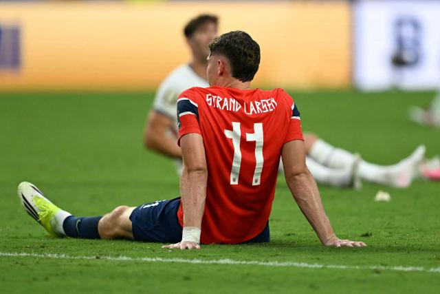Norway's forward #11 Jorgen Strand Larsen reacts after losing the 2026 World Cup football tournament quarter-final match between Norway and England at Miami Stadium in Miami Gardens on July 11, 2026.  (Photo by CHANDAN KHANNA / AFP)