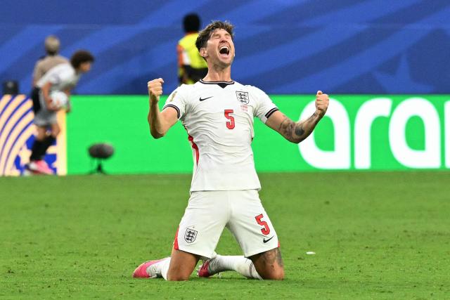 England's defender #05 John Stones reacts after winning the 2026 World Cup football tournament quarter-final match between Norway and England at Miami Stadium in Miami Gardens on July 11, 2026.  (Photo by CHANDAN KHANNA / AFP)