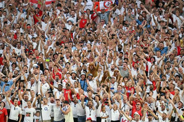 England's fans celebrate after winning the 2026 World Cup football tournament quarter-final match between Norway and England at Miami Stadium in Miami Gardens on July 11, 2026.  (Photo by CHANDAN KHANNA / AFP)