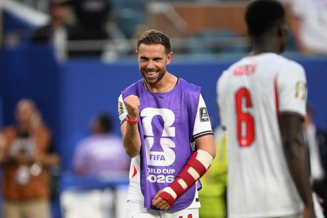 England's midfielder #14 Jordan Henderson celebrates after winning the 2026 World Cup football tournament quarter-final match between Norway and England at Miami Stadium in Miami Gardens on July 11, 2026.  (Photo by MAURO PIMENTEL / AFP)