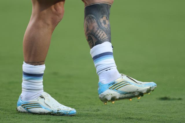 Argentina's forward #10 Lionel Messi's cleats are seen as he warms up ahead of the 2026 World Cup football tournament quarter-final match between Argentina and Switzerland at the Kansas City Stadium in Kansas City on July 11, 2026.  (Photo by Odd ANDERSEN / AFP)