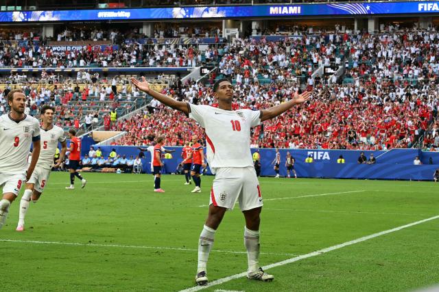 TOPSHOT - England's midfielder #10 Jude Bellingham celebrates scoring his team's second goal during the 2026 World Cup football tournament quarter-final match between Norway and England at Miami Stadium in Miami on July 11, 2026.  (Photo by ROBERTO SCHMIDT / AFP)