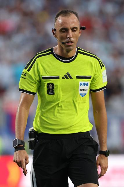Portuguese referee Joao Pinheiro gestures during the 2026 World Cup football tournament quarter-final match between Argentina and Switzerland at the Kansas City Stadium in Kansas City on July 11, 2026.  (Photo by Odd ANDERSEN / AFP)