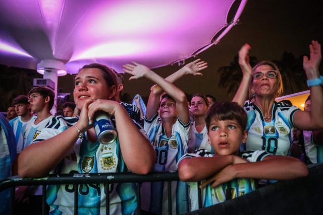 Argentina fans react as they follow the World Cup quarterfinal football match between Argentina and Switzerland, at a watch party in Miami Beach, Florida, on July 11, 2026. (Photo by Giorgio Viera / AFP)