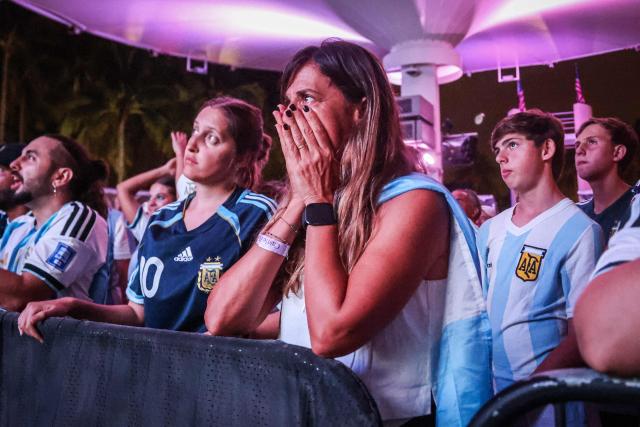 Argentina fans react as they follow the World Cup quarterfinal football match between Argentina and Switzerland, at a watch party in Miami Beach, Florida, on July 11, 2026. (Photo by Giorgio Viera / AFP)