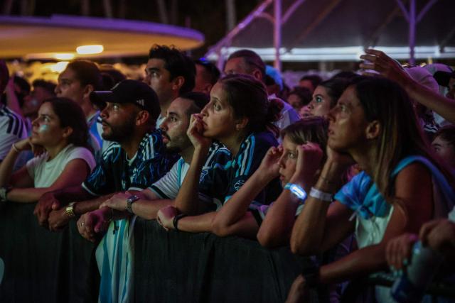 Argentina fans react as they follow the World Cup quarterfinal football match between Argentina and Switzerland, at a watch party in Miami Beach, Florida, on July 11, 2026. (Photo by Giorgio Viera / AFP)