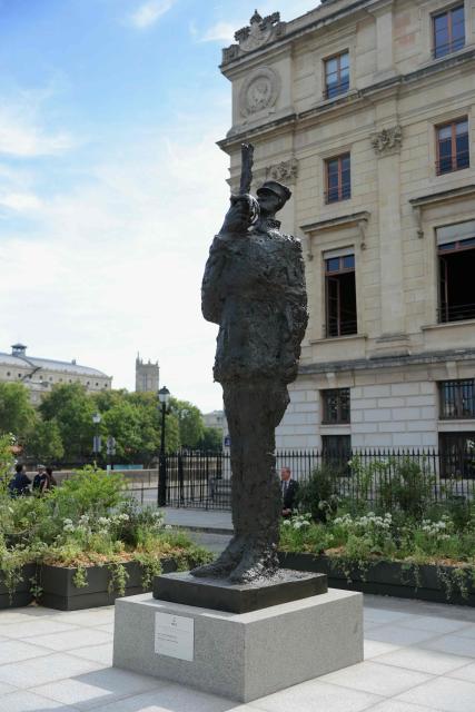 EDITORS NOTE: Graphic content / This photograph shows the statue depicting Captain Alfred Dreyfus ahead of its inauguration as part of a tribute ceremony on the first national day dedicated to the recognition of his innocence by the Court of Cassation in 1906, and the fight against the resurgence of antisemitism, 120 years later on the Ile de la Cite near the Cour de Cassation in Paris, on July 12, 2026. "The Dreyfus Affair" - the captain was accused of high treason and espionage on behalf of Germany - tore French public opinion apart for more than a decade against a backdrop of antisemitism and political-military conspiracy. (Photo by Thomas SAMSON / POOL / AFP)
