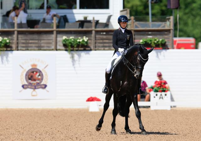 Leonie Richter from Germany rides the horse Lord Europe during the FEI Grand Prix Kür dressage competition at the Falsterbo horse show in Falsterbo, Sweden July 12, 2026. (Photo by Andreas Hillergren/TT / TT News Agency / AFP) / Sweden OUT