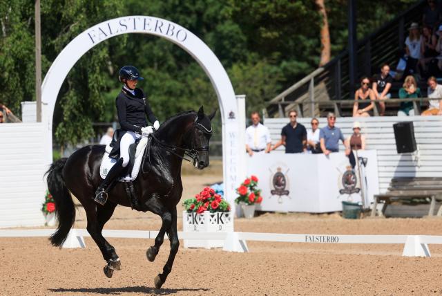 Leonie Richter from Germany rides the horse Lord Europe during the FEI Grand Prix Kür dressage competition at the Falsterbo horse show in Falsterbo, Sweden July 12, 2026. (Photo by Andreas Hillergren/TT / TT News Agency / AFP) / Sweden OUT