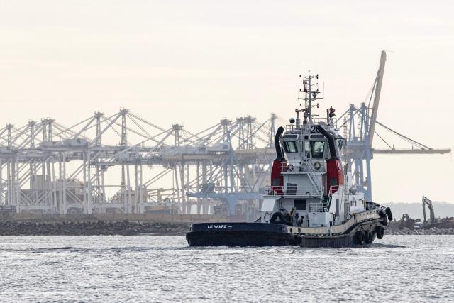 A tugboat arrives at Le Havre harbour, northwestern France on June 30, 2026. (Photo by Alain JOCARD / AFP)