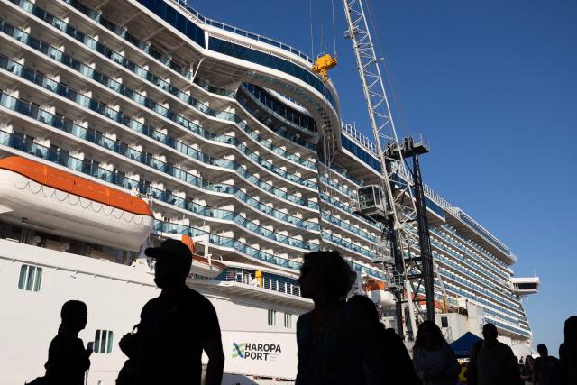 Tourists disembark from a cruise ship in the northwestern harbour of Le Havre on July 8, 2026. (Photo by Alain JOCARD / AFP)