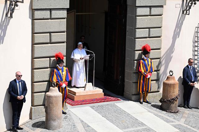 Pope Leo XIV leads the Angelus prayer from the entrance of the Apostolic Palace in Piazza della Liberta (Liberty Square) at the summer papal residence in Castel Gandolfo on 12 July 2026. (Photo by Tiziana FABI / AFP)