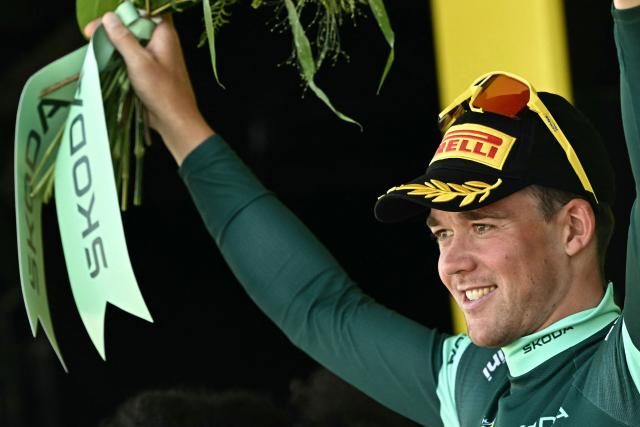 Lidl - Trek team's Danish rider Mads Pedersen celebrates on the podium with the best sprinter's green jersey after the 9th stage of the 113th edition of the Tour de France cycling race, 154,6 km between Malemort and Ussel in central France, on July 12, 2026. (Photo by Loic VENANCE / AFP)