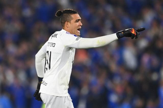 (FILES) Millonarios' goalkeeper Alvaro Montero celebrates after his team scored during the Copa Sudamericana group stage first leg football match between Millonarios and Defensa y Justicia, at the El Campin stadium in Bogota on April 4, 2023. Colombia goalkeeper Alvaro Montero has reached an agreement to join Argentina's Boca Juniors in the coming hours, the Buenos Aires club announced on July 12, 2026. (Photo by Juan BARRETO / AFP)