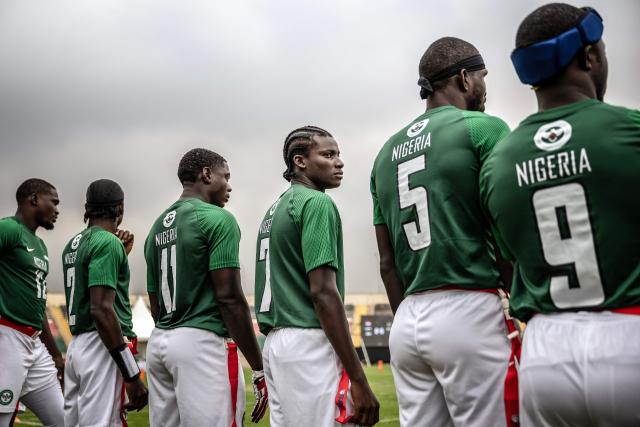 Players of Nigeria’s national men’s senior flag football team line up to take the field before their game against Egypt during the NFL Flag Africa Continental Championships at Nyayo Stadium in Nairobi on July 10, 2026. American Football's NFL came to Kenya this weekend for its latest competition on the African continent as it seeks to win converts to the sport. US sports have increasingly sought to break into the African market, with the NBA launching a high-profile Basketball Africa League in 2019, based in Rwanda.Recent days saw a third annual flag football competition staged by the National Football League (NFL) in Africa -- a non-contact version of the sport that has grown in popularity around the world and will make its Olympics debut at the 2028 Los Angeles Games. (Photo by Luis TATO / AFP)