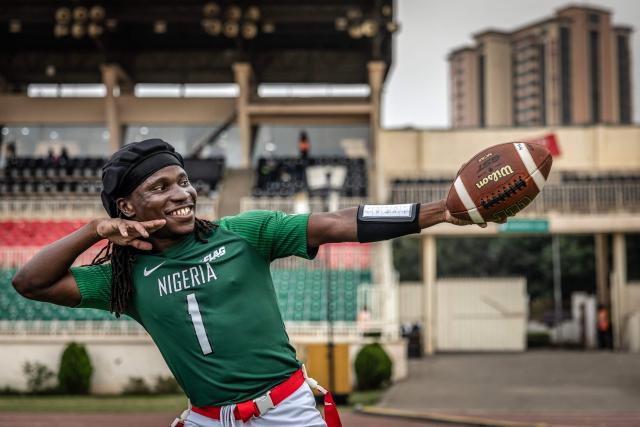 A player of Nigeria’s national men’s senior flag football team celebrates after scoring a touchdown against Egypt during their game at the NFL Flag Africa Continental Championships at Nyayo Stadium in Nairobi on July 10, 2026. American Football's NFL came to Kenya this weekend for its latest competition on the African continent as it seeks to win converts to the sport. US sports have increasingly sought to break into the African market, with the NBA launching a high-profile Basketball Africa League in 2019, based in Rwanda.Recent days saw a third annual flag football competition staged by the National Football League (NFL) in Africa -- a non-contact version of the sport that has grown in popularity around the world and will make its Olympics debut at the 2028 Los Angeles Games. (Photo by Luis TATO / AFP)