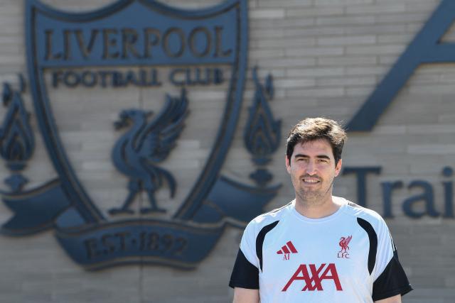 Andoni Iraola, the new manager for English Premier League football side Liverpool, poses as he meets the media at the team's training ground in Kirkby, Liverpool, north-west England on July 13, 2026. (Photo by PETER POWELL / AFP)