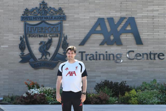 Andoni Iraola, the new manager for English Premier League football side Liverpool, poses as he meets the media at the team's training ground in Kirkby, Liverpool, north-west England on July 13, 2026. (Photo by PETER POWELL / AFP)