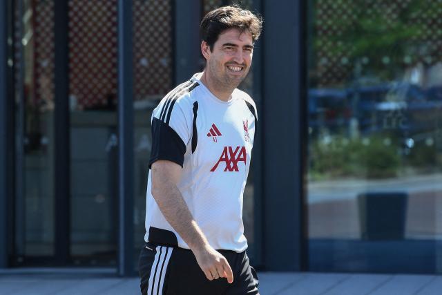 Andoni Iraola, the new manager for English Premier League football side Liverpool, walks out to meet the media at the team's training ground in Kirkby, Liverpool, north-west England on July 13, 2026. (Photo by PETER POWELL / AFP)