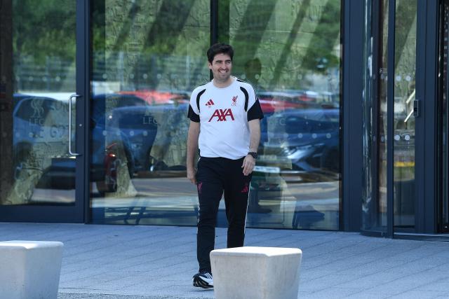 Andoni Iraola, the new manager for English Premier League football side Liverpool, walks out to meet the media at the team's training ground in Kirkby, Liverpool, north-west England on July 13, 2026. (Photo by PETER POWELL / AFP)