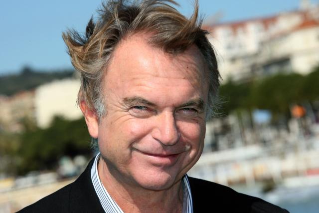(FILES) New-Zealand actor Sam Neill of the TV show "Iron Road", poses for photographers in Cannes, southern France, at the start of the 45th edition of the MIPTV, the world's audiovisual and digital content market on April 7, 2008. "Jurassic Park" star Sam Neill died in Australia on July 13, 2026 aged 78, his family said in a statement that described the beloved actor's death as "sudden and unexpected". (Photo by Valery HACHE / AFP)