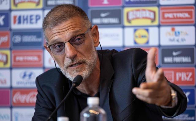 Former Croatian international defender Slaven Bilic speaks during a press conference after being appointed Croatia's national football team head coach, in Zagreb on July 13, 2026. Slaven Bilic who previously coached Croatia between 2006 and 2012, is replacing Zlatko Dalic who resigned after the country's World Cup exit. The 57-year-old, who also coached English clubs West Ham, West Bromwich Albion and Watford, was "unanimously appointed" as head coach, the Croatian Football Federation (HNS) said. (Photo by Marko PERKOV / AFP)