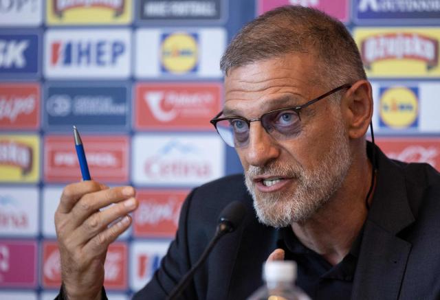 Former Croatian international defender Slaven Bilic speaks during a press conference after being appointed Croatia's national football team head coach, in Zagreb on July 13, 2026. Slaven Bilic who previously coached Croatia between 2006 and 2012, is replacing Zlatko Dalic who resigned after the country's World Cup exit. The 57-year-old, who also coached English clubs West Ham, West Bromwich Albion and Watford, was "unanimously appointed" as head coach, the Croatian Football Federation (HNS) said. (Photo by Marko PERKOV / AFP)