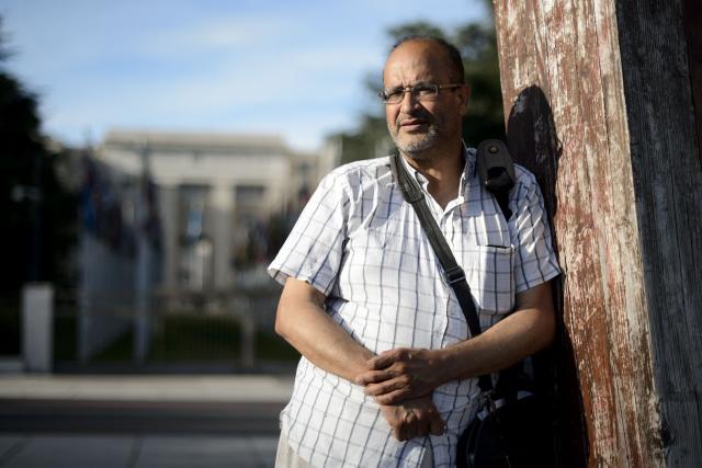 (FILES) French-Moroccan journalist Ali Lmrabet poses outside the United Nations offices in Geneva on June 29, 2015. The prominent Moroccan journalist and critic of the kingdom's government was set to appear before a prosecutor on July 13, 2026, for "spreading false information" after his arrest upon return to the country from Spain, his wife told AFP. Lmrabet, 66, is a leading figure in Morocco's independent press and has lived in Spain for years. He holds dual French-Moroccan citizenship. (Photo by Fabrice COFFRINI / AFP)