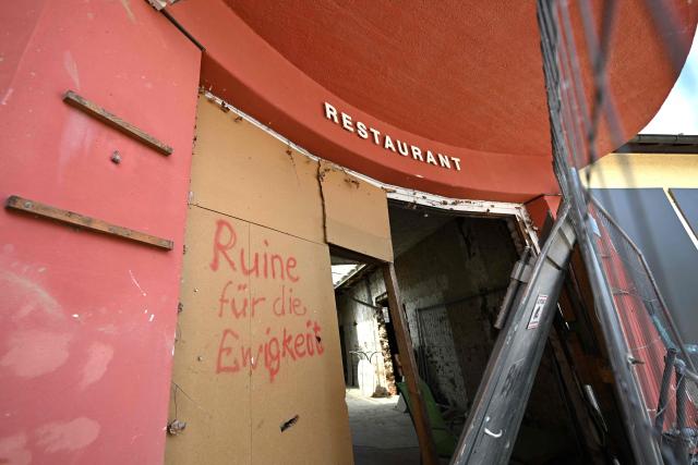 A photo shows a closed restaurant near Mayschoss, western Germany on July 13, 2026, five years after the dramatic floods of July 14 and 15, 2021 in Rhineland-Palatinate and North Rhine-Westphalia. More than 180 people lost their lives in severe floods that pummelled western Germany in mid-July 2021, raising questions about whether enough was done to forewarn residents. (Photo by Ina FASSBENDER / AFP)