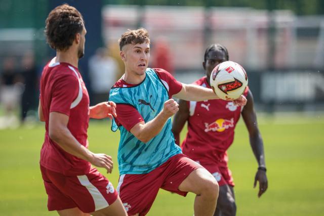 Leipzig's German midfielder #10 Brajan Gruda (C) runs for the ball during a training session at the training grounds of German first division Bundesliga football club RB Leipzig in Leipzig, eastern Germany on July 13, 2026. (Photo by Ronny HARTMANN / AFP)