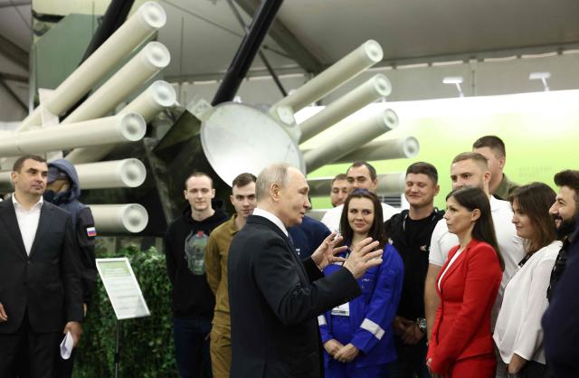 In this pool photograph distributed by the Russian state agency Sputnik, Russia's President Vladimir Putin tours an exhibition of the Everything for the Victory patriotic forum in Moscow on July 13, 2026. (Photo by Artem Geodakyan / POOL / AFP)