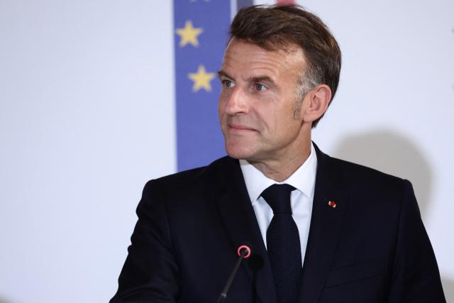 France's President Emmanuel Macron takes part in a summit of the Coalition of the Willing to support Ukraine at the Hotel des Invalides in Paris on July 13, 2026. The summit meeting of the Coalition of the Willing -- launched by France and the United Kingdom to provide military support to Ukraine after Russia's full-scale invasion -- will push for a ceasefire and renewed peace talks, the French presidency said. (Photo by Teresa Suarez / POOL / AFP)