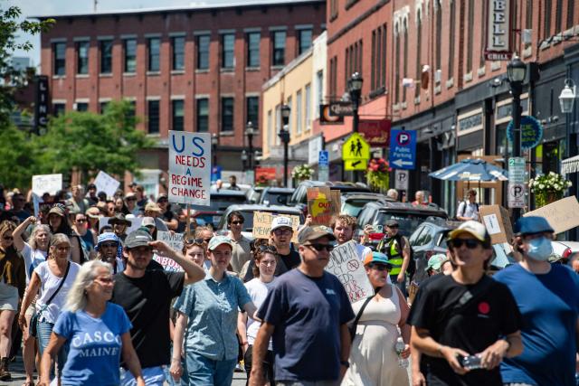 Demonstrators protest a federal law enforcement involved shooting in Biddeford, Maine on July 13, 2026. A shooting on Monday involving US immigration agents killed a man identified by rights groups as a 26-year-old Colombian man, an incident likely to fuel more criticism of the Trump administrations deportation drive. The shooting happened in Biddeford, a town of 22,000 people in the northern state of Maine and comes a week after an Immigration and Customs Enforcement (ICE) agent shot dead a Mexican man in Texas. (Photo by Joseph Prezioso / AFP)