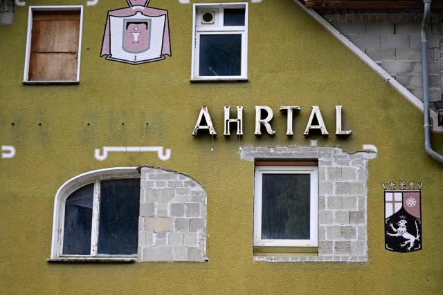 A photo shows a closed hotel in Schuld, western Germany on July 13, 2026, five years after the dramatic floods of July 14 and 15, 2021 in Rhineland-Palatinate and North Rhine-Westphalia. More than 180 people lost their lives in severe floods that pummelled western Germany in mid-July 2021, raising questions about whether enough was done to forewarn residents. (Photo by Ina FASSBENDER / AFP)