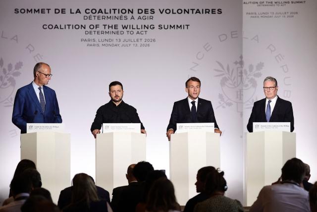 (From L) German Chancellor Friedrich Merz, Ukraine's President Volodymyr Zelensky, France's President Emmanuel Macron and Britain's Prime Minister Keir Starmer address a joint press conference after the summit of the Coalition of the Willing to support Ukraine at the Hotel des Invalides in Paris on July 13, 2026. The summit meeting of the Coalition of the Willing -- launched by France and the United Kingdom to provide military support to Ukraine after Russia's full-scale invasion -- will push for a ceasefire and renewed peace talks, the French presidency said. (Photo by Teresa SUAREZ / POOL / AFP)