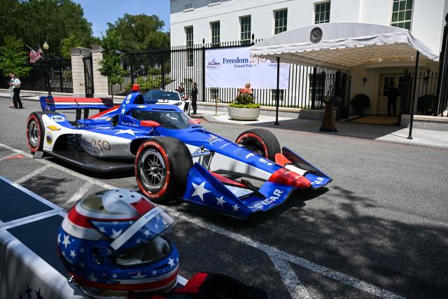 An Indy car is displayed after US President Donald Trump hosted a a Freedom 250 Grand Prix Showcase outside the White House in Washington, DC, on July 13, 2026. The Freedom 250 Grand Prix race will be the fifteenth round of the 2026 IndyCar Series, taking place on August 22-23 in Washington, DC. (Photo by Oliver Contreras / AFP)