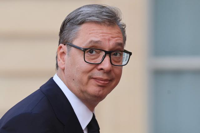 Serbia's President Aleksandar Vucic arrives for a dinner of the Coalition of the Willing to support Ukraine at The Elysee Presidential Palace in Paris on July 13, 2026. Macron is convening a summit in Paris of the Coalition of the Willing to support Ukraine - launched by France and the United Kingdom to provide military support to Ukraine after Russia's full-scale invasion - that will be attended by Ukraine's President, signaling the "strategic awakening" he seeks for Europe in the face of Russia and United States. (Photo by Ludovic MARIN / AFP)