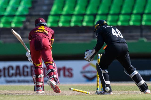 Shai Hope (L) of West Indies bowled by Jayden Lennox of New Zealand during the second one-day international (ODI) cricket match between West Indies and New Zealand at Guyana National Stadium in Providence, Guyana on July 13, 2026. (Photo by Randy Brooks / AFP)